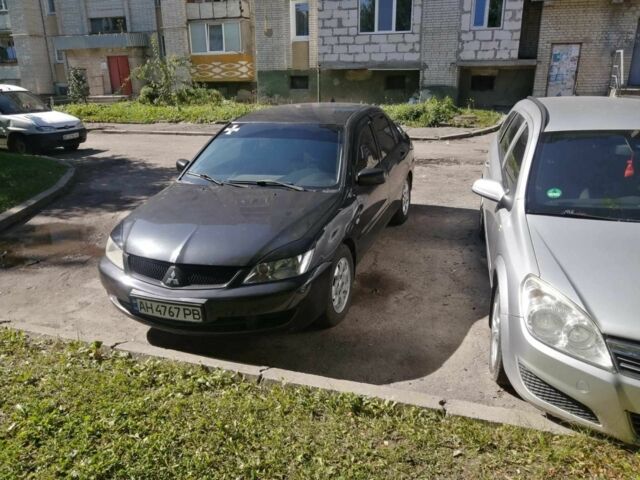 Сірий Міцубісі Lancer, об'ємом двигуна 1.6 л та пробігом 1 тис. км за 3500 $, фото 6 на Automoto.ua