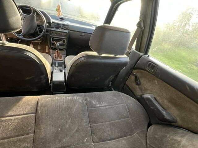 Сірий Міцубісі Lancer, об'ємом двигуна 1.5 л та пробігом 190 тис. км за 550 $, фото 12 на Automoto.ua