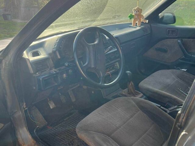 Сірий Міцубісі Lancer, об'ємом двигуна 1.5 л та пробігом 190 тис. км за 550 $, фото 11 на Automoto.ua