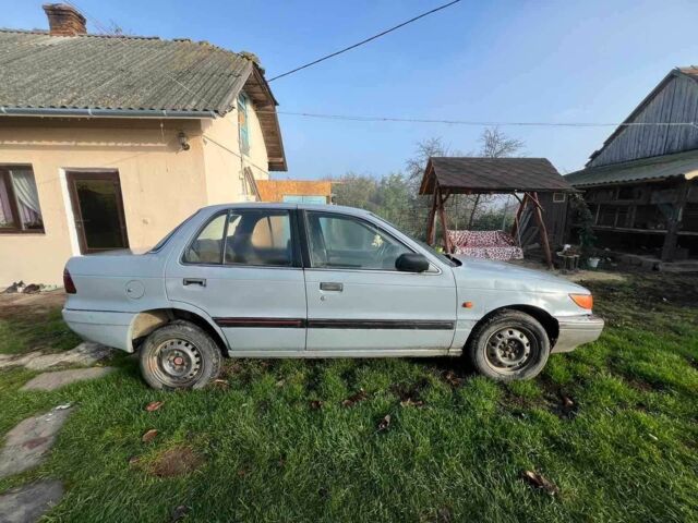 Сірий Міцубісі Lancer, об'ємом двигуна 1.5 л та пробігом 190 тис. км за 550 $, фото 5 на Automoto.ua