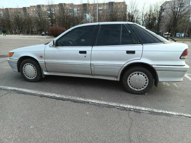 Сірий Міцубісі Lancer, об'ємом двигуна 0.16 л та пробігом 350 тис. км за 1236 $, фото 2 на Automoto.ua