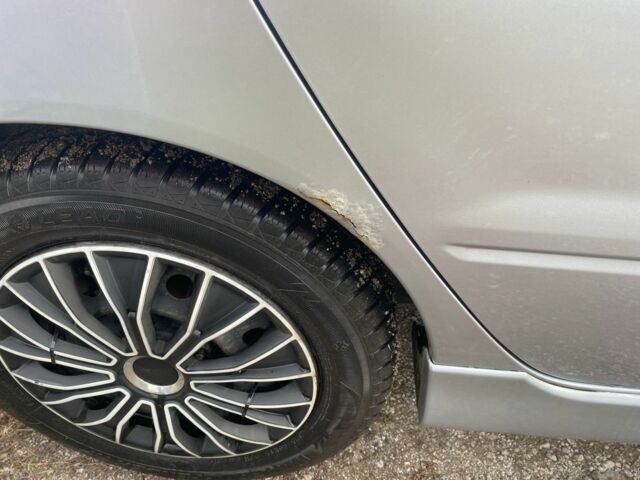 Серый Мицубиси Лансер, объемом двигателя 1.6 л и пробегом 289 тыс. км за 3150 $, фото 3 на Automoto.ua