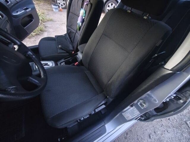 Серый Мицубиси Лансер, объемом двигателя 1.6 л и пробегом 98 тыс. км за 4800 $, фото 6 на Automoto.ua