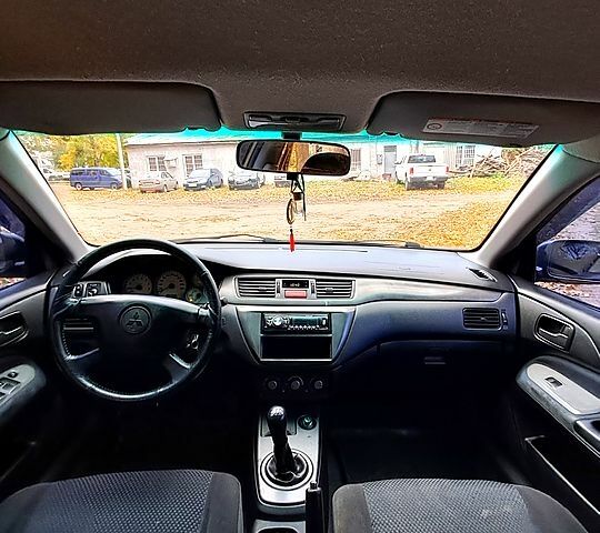 Сірий Міцубісі Lancer, об'ємом двигуна 1.6 л та пробігом 206 тис. км за 3300 $, фото 5 на Automoto.ua