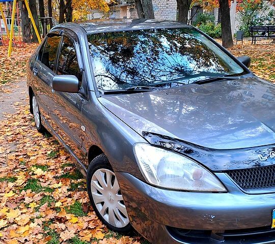 Сірий Міцубісі Lancer, об'ємом двигуна 1.6 л та пробігом 206 тис. км за 3300 $, фото 8 на Automoto.ua