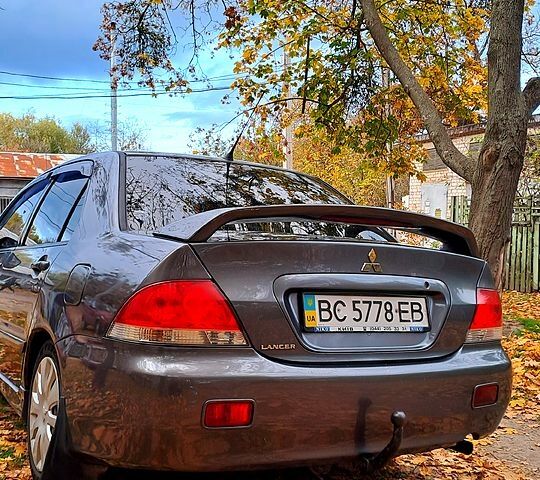 Сірий Міцубісі Lancer, об'ємом двигуна 1.6 л та пробігом 206 тис. км за 3300 $, фото 3 на Automoto.ua