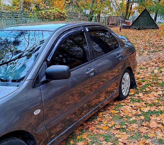 Сірий Міцубісі Lancer, об'ємом двигуна 1.6 л та пробігом 206 тис. км за 3300 $, фото 2 на Automoto.ua