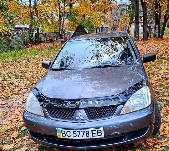 Сірий Міцубісі Lancer, об'ємом двигуна 1.6 л та пробігом 206 тис. км за 3300 $, фото 9 на Automoto.ua