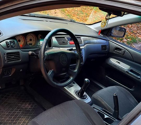 Сірий Міцубісі Lancer, об'ємом двигуна 1.6 л та пробігом 206 тис. км за 3300 $, фото 4 на Automoto.ua