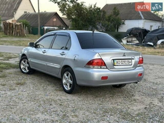 Серый Мицубиси Лансер, объемом двигателя 1.6 л и пробегом 197 тыс. км за 4200 $, фото 2 на Automoto.ua