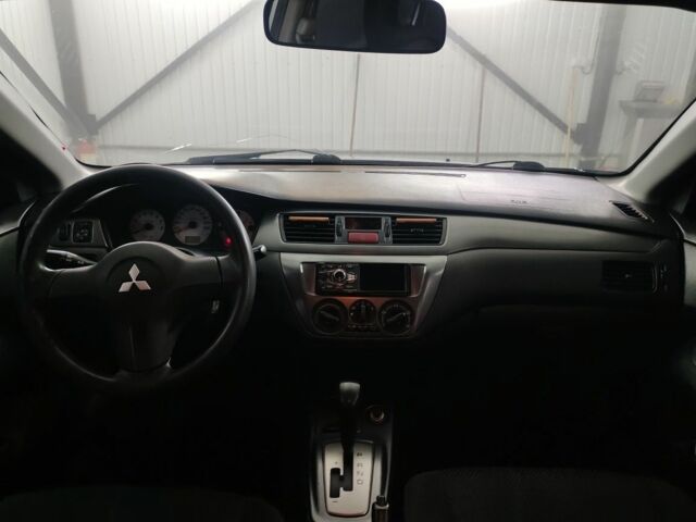 Серый Мицубиси Лансер, объемом двигателя 1.6 л и пробегом 330 тыс. км за 3900 $, фото 6 на Automoto.ua