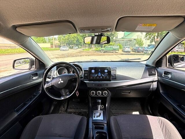 Сірий Міцубісі Lancer, об'ємом двигуна 1.8 л та пробігом 238 тис. км за 6700 $, фото 6 на Automoto.ua