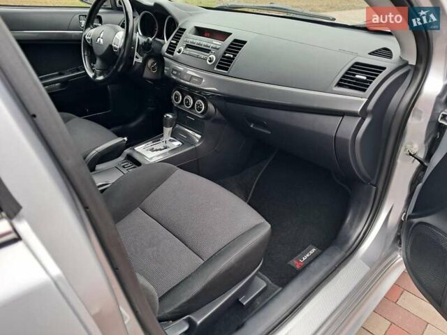 Серый Мицубиси Лансер, объемом двигателя 1.8 л и пробегом 155 тыс. км за 7350 $, фото 13 на Automoto.ua