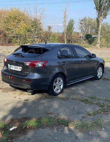 Сірий Міцубісі Lancer, об'ємом двигуна 1.8 л та пробігом 210 тис. км за 7000 $, фото 3 на Automoto.ua