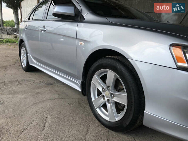 Серый Мицубиси Лансер, объемом двигателя 1.8 л и пробегом 120 тыс. км за 8000 $, фото 2 на Automoto.ua