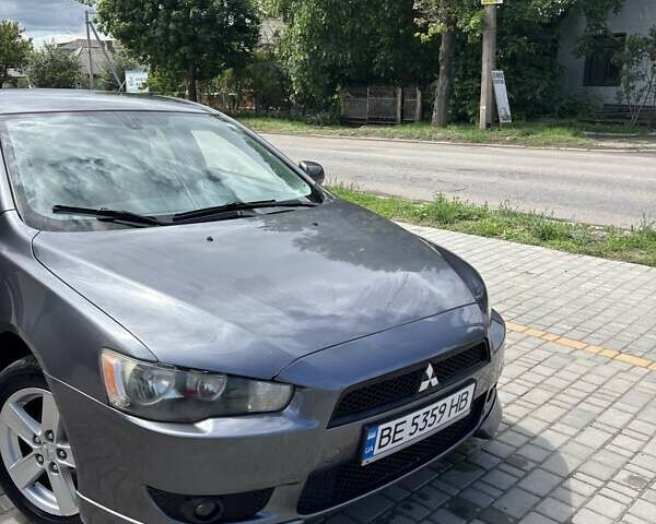 Серый Мицубиси Лансер, объемом двигателя 1.8 л и пробегом 238 тыс. км за 6500 $, фото 5 на Automoto.ua