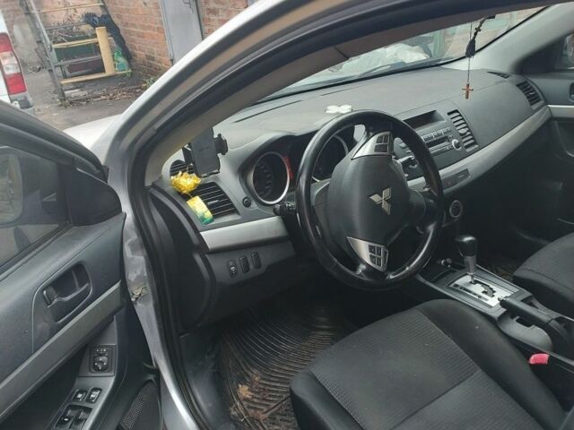 Сірий Міцубісі Lancer, об'ємом двигуна 2 л та пробігом 150 тис. км за 6200 $, фото 1 на Automoto.ua