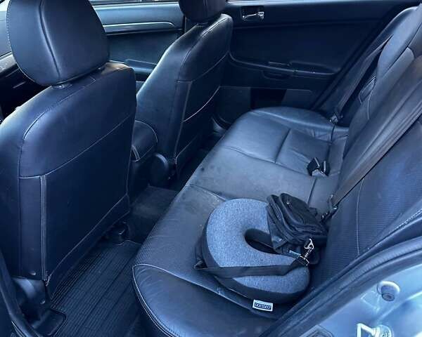 Сірий Міцубісі Lancer, об'ємом двигуна 1.8 л та пробігом 230 тис. км за 7200 $, фото 4 на Automoto.ua
