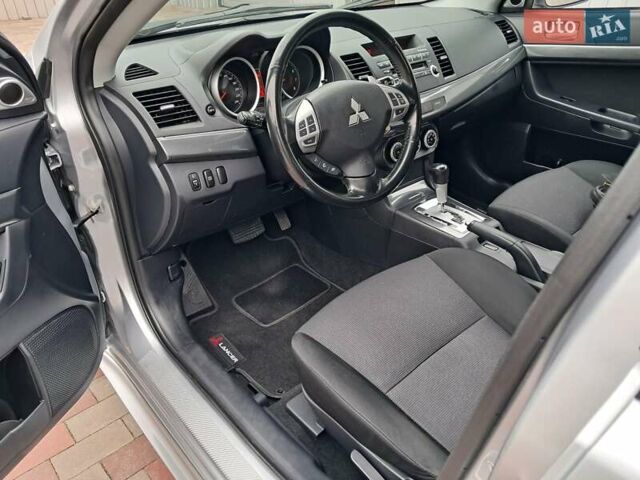 Серый Мицубиси Лансер, объемом двигателя 1.8 л и пробегом 155 тыс. км за 7350 $, фото 14 на Automoto.ua