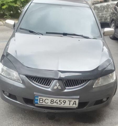 Серый Мицубиси Лансер, объемом двигателя 1.6 л и пробегом 318 тыс. км за 3350 $, фото 6 на Automoto.ua