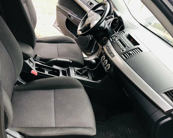 Сірий Міцубісі Lancer, об'ємом двигуна 1.8 л та пробігом 44 тис. км за 5299 $, фото 3 на Automoto.ua