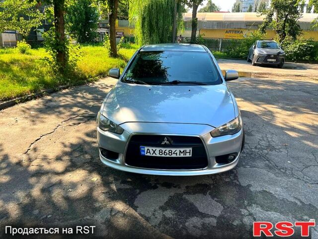 Серый Мицубиси Лансер, объемом двигателя 1.8 л и пробегом 246 тыс. км за 5600 $, фото 5 на Automoto.ua