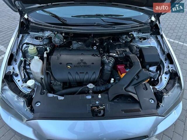 Сірий Міцубісі Lancer, об'ємом двигуна 1.8 л та пробігом 278 тис. км за 6650 $, фото 18 на Automoto.ua