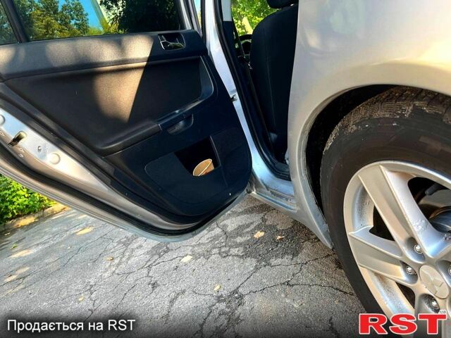 Серый Мицубиси Лансер, объемом двигателя 1.8 л и пробегом 246 тыс. км за 5600 $, фото 10 на Automoto.ua