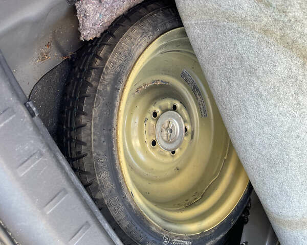 Серый Мицубиси Лансер, объемом двигателя 1.5 л и пробегом 139 тыс. км за 6600 $, фото 25 на Automoto.ua