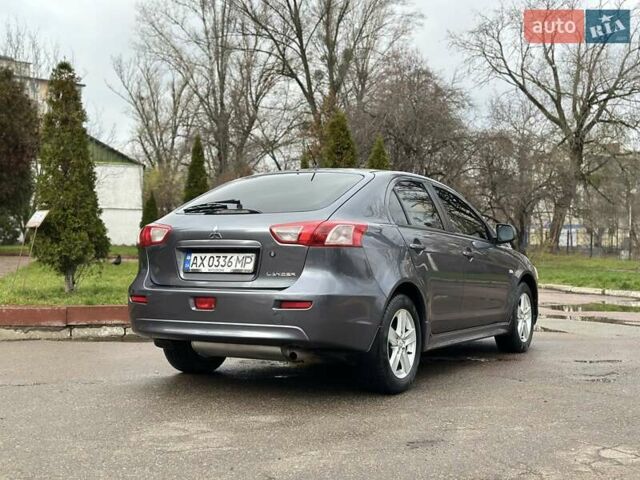 Серый Мицубиси Лансер, объемом двигателя 1.8 л и пробегом 44 тыс. км за 6499 $, фото 17 на Automoto.ua