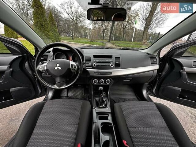 Серый Мицубиси Лансер, объемом двигателя 1.8 л и пробегом 44 тыс. км за 6499 $, фото 22 на Automoto.ua