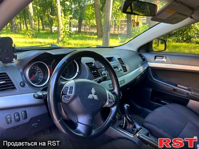 Серый Мицубиси Лансер, объемом двигателя 1.8 л и пробегом 246 тыс. км за 5600 $, фото 7 на Automoto.ua