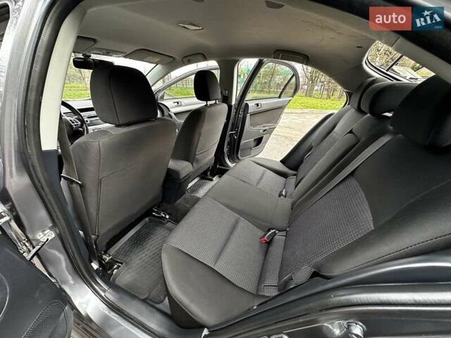 Серый Мицубиси Лансер, объемом двигателя 1.8 л и пробегом 44 тыс. км за 6499 $, фото 26 на Automoto.ua