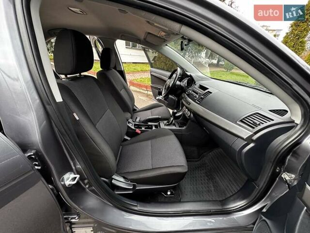 Серый Мицубиси Лансер, объемом двигателя 1.8 л и пробегом 44 тыс. км за 6499 $, фото 24 на Automoto.ua