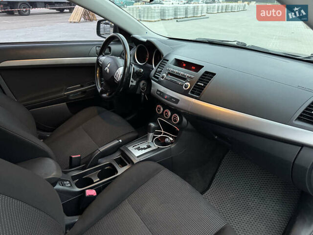 Серый Мицубиси Лансер, объемом двигателя 1.8 л и пробегом 248 тыс. км за 6400 $, фото 10 на Automoto.ua