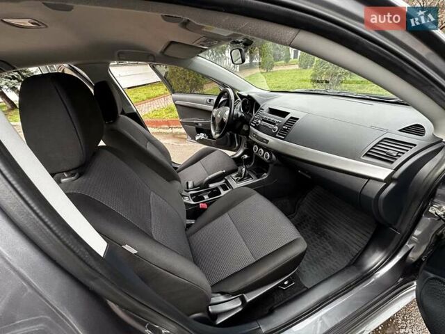 Серый Мицубиси Лансер, объемом двигателя 1.8 л и пробегом 44 тыс. км за 6499 $, фото 23 на Automoto.ua