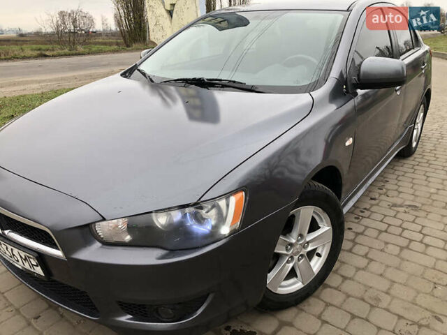 Сірий Міцубісі Lancer, об'ємом двигуна 1.8 л та пробігом 44 тис. км за 5299 $, фото 14 на Automoto.ua