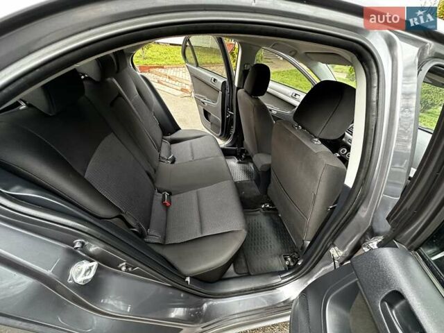 Серый Мицубиси Лансер, объемом двигателя 1.8 л и пробегом 44 тыс. км за 6499 $, фото 28 на Automoto.ua