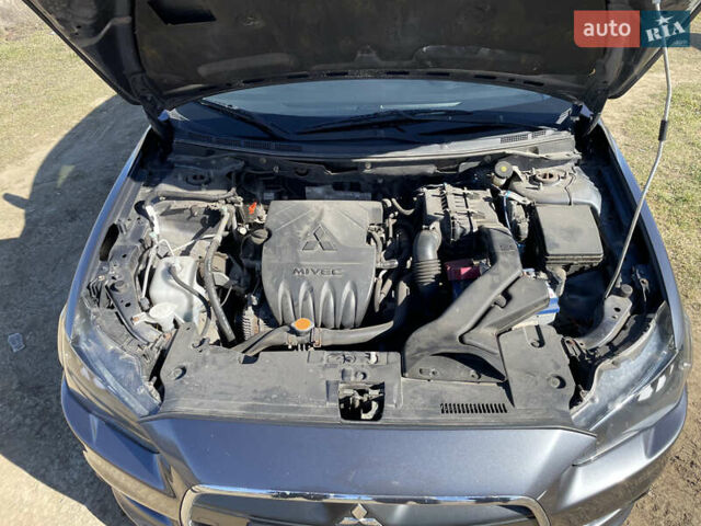 Серый Мицубиси Лансер, объемом двигателя 1.5 л и пробегом 139 тыс. км за 6600 $, фото 20 на Automoto.ua