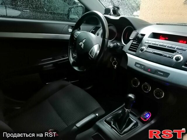 Серый Мицубиси Лансер, объемом двигателя 1.8 л и пробегом 246 тыс. км за 5600 $, фото 8 на Automoto.ua