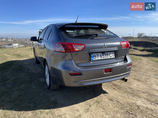 Серый Мицубиси Лансер, объемом двигателя 1.5 л и пробегом 139 тыс. км за 6600 $, фото 8 на Automoto.ua