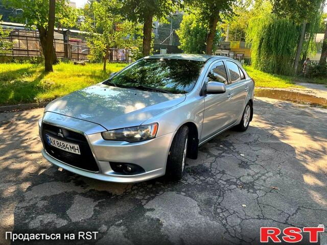 Серый Мицубиси Лансер, объемом двигателя 1.8 л и пробегом 246 тыс. км за 5600 $, фото 3 на Automoto.ua