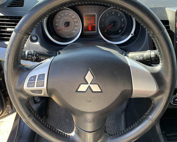 Серый Мицубиси Лансер, объемом двигателя 1.5 л и пробегом 139 тыс. км за 6600 $, фото 21 на Automoto.ua