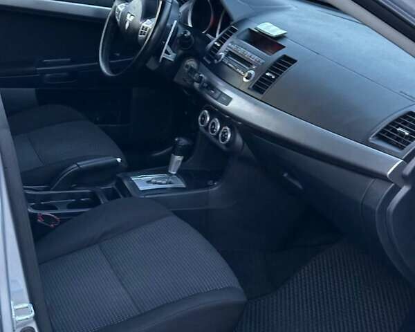 Сірий Міцубісі Lancer, об'ємом двигуна 1.8 л та пробігом 278 тис. км за 6650 $, фото 20 на Automoto.ua