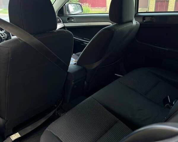 Сірий Міцубісі Lancer, об'ємом двигуна 1.8 л та пробігом 194 тис. км за 6100 $, фото 8 на Automoto.ua