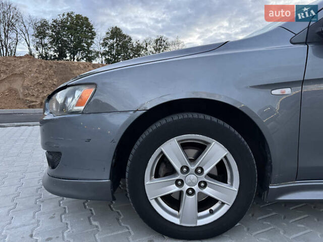 Серый Мицубиси Лансер, объемом двигателя 1.8 л и пробегом 248 тыс. км за 6400 $, фото 5 на Automoto.ua