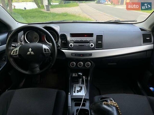 Сірий Міцубісі Lancer, об'ємом двигуна 1.8 л та пробігом 194 тис. км за 6100 $, фото 7 на Automoto.ua