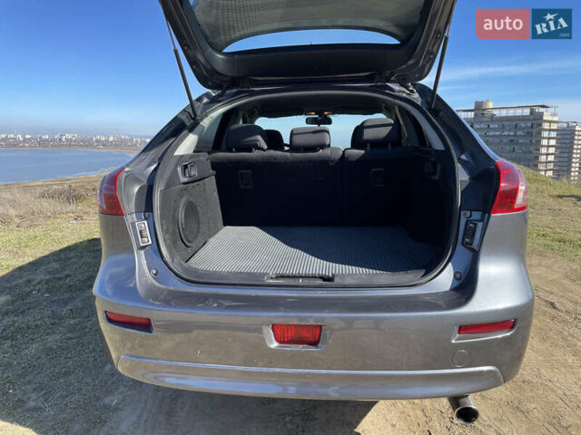 Серый Мицубиси Лансер, объемом двигателя 1.5 л и пробегом 139 тыс. км за 6600 $, фото 9 на Automoto.ua