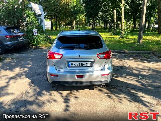 Серый Мицубиси Лансер, объемом двигателя 1.8 л и пробегом 246 тыс. км за 5600 $, фото 2 на Automoto.ua