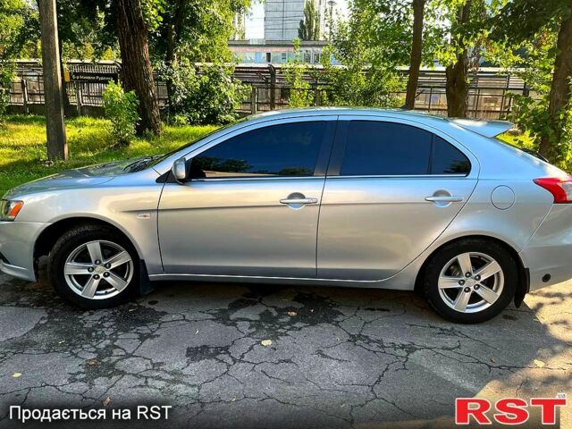 Серый Мицубиси Лансер, объемом двигателя 1.8 л и пробегом 246 тыс. км за 5600 $, фото 6 на Automoto.ua